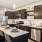 kitchen interior with ample counter space and on wood-style flooring