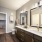 bathroom with a closet and bright lighting