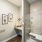 bathroom with a closet and bright lighting