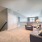 living room with large open spaces and easy access to the stairs
